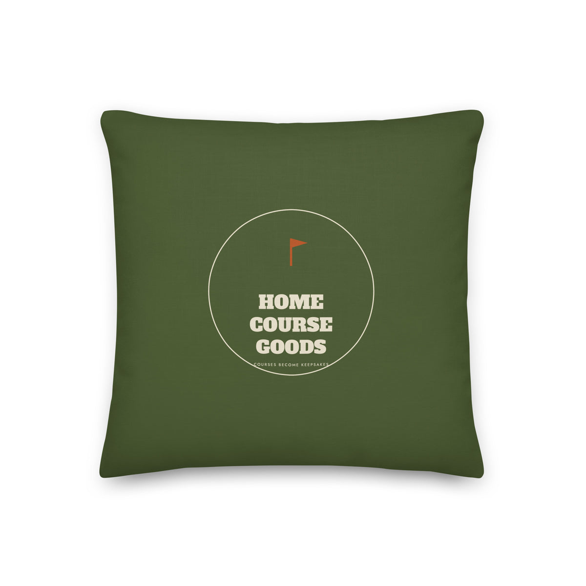 The back of the golf pillow, olive with the Home Course Goods roundel