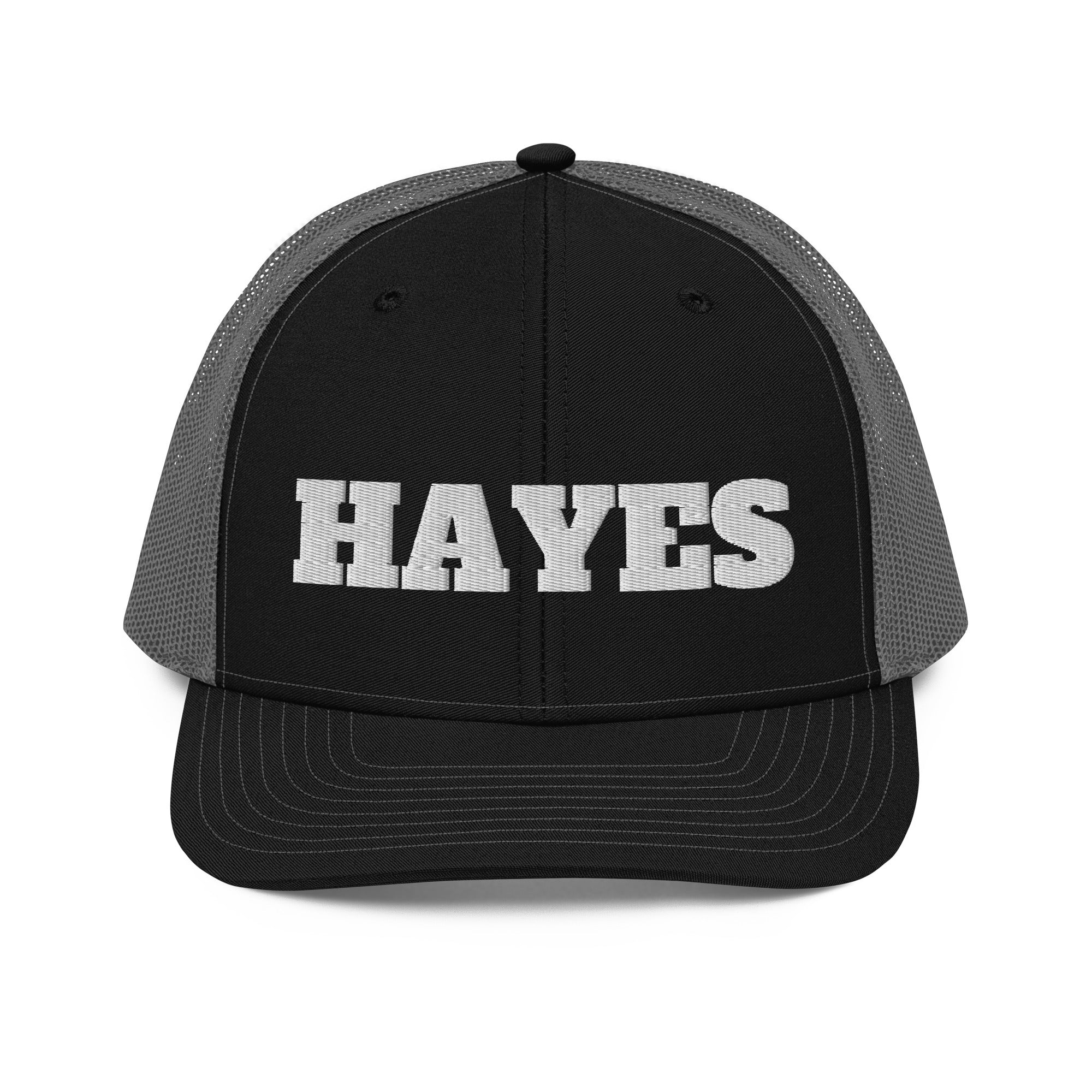 A trucker cap embroidered with the golfer's name in real thread